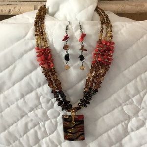 C G designs necklace and earrings